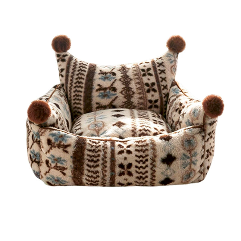 Patterned bolster pet bed with pom-pom corners